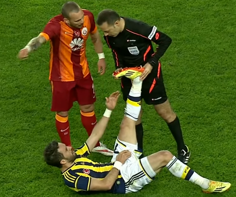 football player with cramp